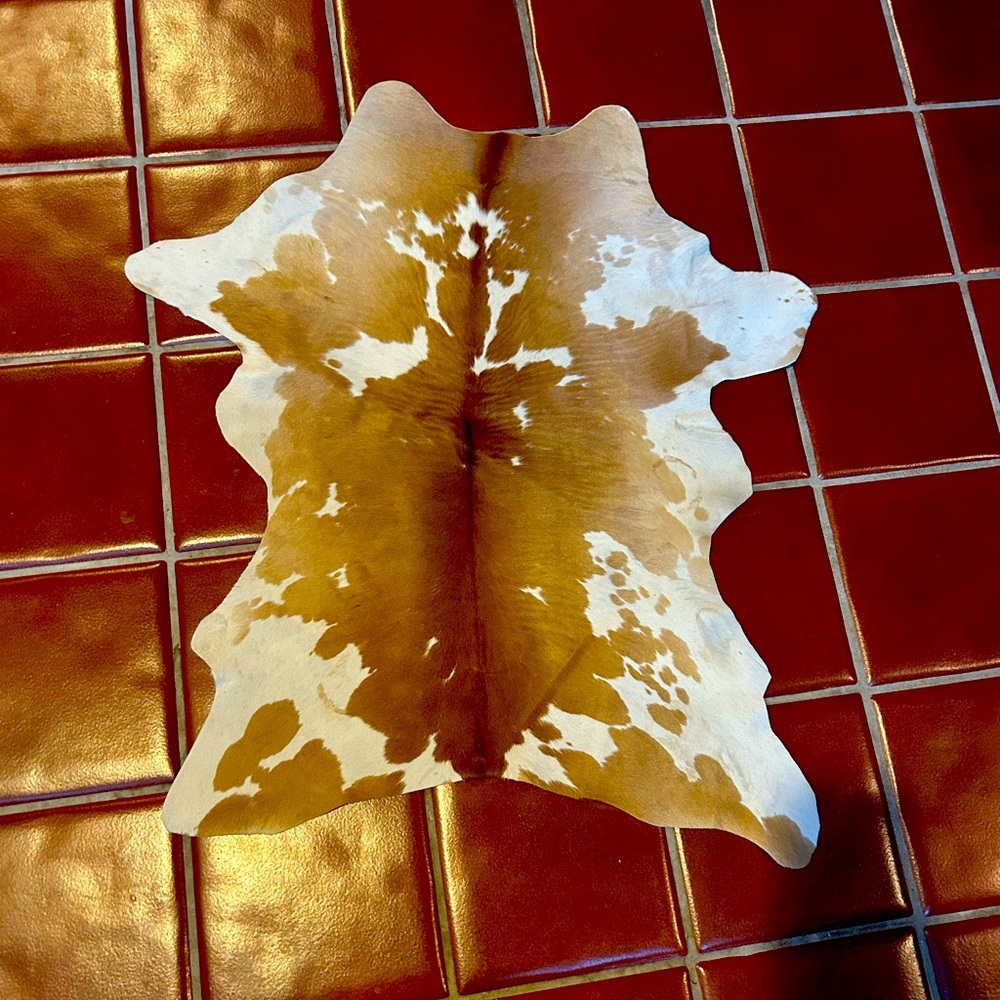 Small calf cowhide rug or table cover